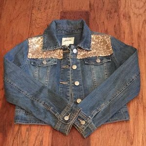Denim Jacket with gold sequin detail.